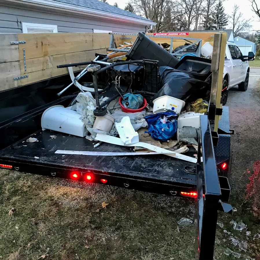 Roll-off dumpster delivered to a residential driveway in Egg Harbor